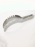 A stainless steel watermelon cutting tool